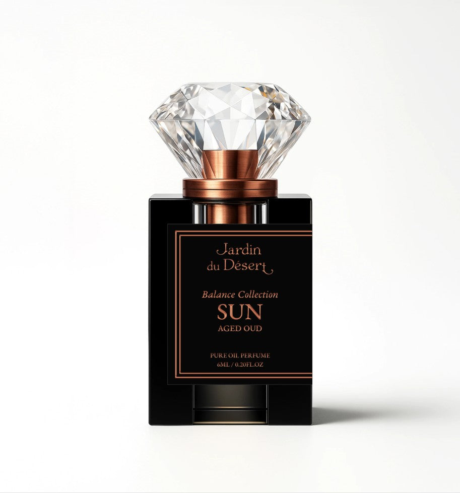 A luxury perfume bottle from Jardin du Desert Balance Collection, named 'SUN' aged Oud. 